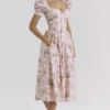 Lulabell Midi-Kleid aus Baumwolle mit rosa Schleifenprint Lulabell Midi-Kleid aus Baumwolle mit rosa Schleifenprint