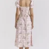 Lulabell Midi-Kleid aus Baumwolle mit rosa Schleifenprint Lulabell Midi-Kleid aus Baumwolle mit rosa Schleifenprint