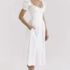 Lulabell Weißes Midi-Kleid aus Stretch-Baumwolle mit Puffärmeln Lulabell Weißes Midi-Kleid aus Stretch-Baumwolle mit Puffärmeln
