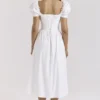 Lulabell Weißes Midi-Kleid aus Stretch-Baumwolle mit Puffärmeln Lulabell Weißes Midi-Kleid aus Stretch-Baumwolle mit Puffärmeln
