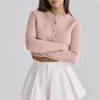Lumi Weiße Baumwoll-Mini-Shorts mit ausgestelltem Bein Lumi Weiße Baumwoll-Mini-Shorts mit ausgestelltem Bein