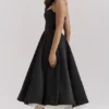 Mademoiselle – Midi-Kleid aus schwarzem Tüll Mademoiselle – Midi-Kleid aus schwarzem Tüll