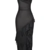Malila Schwarzes Maxikleid mit Rüschen Malila Schwarzes Maxikleid mit Rüschen