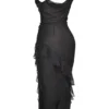 Malila Schwarzes Maxikleid mit Rüschen Malila Schwarzes Maxikleid mit Rüschen