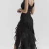 Malila Schwarzes Maxikleid mit Rüschen Malila Schwarzes Maxikleid mit Rüschen