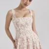 Mariabella Cremefarbenes Midi-Sommerkleid aus Baumwolle mit Blumenprint Mariabella Cremefarbenes Midi-Sommerkleid aus Baumwolle mit Blumenprint