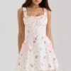 Marianella Mini-Kleid aus Stretch-Baumwolle mit cremefarbenem Rosenprint Marianella Mini-Kleid aus Stretch-Baumwolle mit cremefarbenem Rosenprint