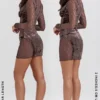 Marica Braunes Korsetts-Kleid aus Samt und Spitze Marica Braunes Korsetts-Kleid aus Samt und Spitze