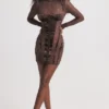 Marica Braunes Korsetts-Kleid aus Samt und Spitze Marica Braunes Korsetts-Kleid aus Samt und Spitze