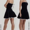 Marilla – Schwarzes, trägerloses Samt-Kleid Marilla – Schwarzes, trägerloses Samt-Kleid