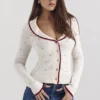 Marla – Strickjacke mit Elfenbeinfarbenen Kaschmir-Einsätzen Marla – Strickjacke mit Elfenbeinfarbenen Kaschmir-Einsätzen