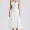 Milia Midi-Kleid aus weißer Broderie Anglais und Baumwolle Milia Midi-Kleid aus weißer Broderie Anglais und Baumwolle