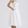 Milia Midi-Kleid aus weißer Broderie Anglais und Baumwolle Milia Midi-Kleid aus weißer Broderie Anglais und Baumwolle
