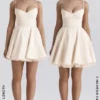 Minimoiselle Vintage-Minikleid aus cremefarbenem Tüll Minimoiselle Vintage-Minikleid aus cremefarbenem Tüll