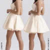 Minimoiselle Vintage-Minikleid aus cremefarbenem Tüll Minimoiselle Vintage-Minikleid aus cremefarbenem Tüll