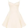 Minimoiselle Vintage-Minikleid aus cremefarbenem Tüll Minimoiselle Vintage-Minikleid aus cremefarbenem Tüll