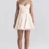 Minimoiselle Vintage-Minikleid aus cremefarbenem Tüll Minimoiselle Vintage-Minikleid aus cremefarbenem Tüll