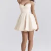 Minimoiselle Vintage-Minikleid aus cremefarbenem Tüll Minimoiselle Vintage-Minikleid aus cremefarbenem Tüll