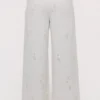 Mirea Weiße Baumwollhose mit Broderie Anglaise und weitem Bein Mirea Weiße Baumwollhose mit Broderie Anglaise und weitem Bein