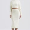 Mishka Cremefarbener Midi-Rock aus weichem Bouclé-Strick Mishka Cremefarbener Midi-Rock aus weichem Bouclé-Strick
