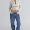 Mistle-Bow Cremefarbene Jacquard-Strickjacke Mistle-Bow Cremefarbene Jacquard-Strickjacke