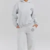 Muse Hellgrau melierter Baumwoll-Hoodie mit Fleece-Rückseite Muse Hellgrau melierter Baumwoll-Hoodie mit Fleece-Rückseite