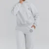 Muse Hellgrau melierter Baumwoll-Hoodie mit Fleece-Rückseite Muse Hellgrau melierter Baumwoll-Hoodie mit Fleece-Rückseite