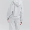Muse Hellgrau melierter Baumwoll-Hoodie mit Fleece-Rückseite Muse Hellgrau melierter Baumwoll-Hoodie mit Fleece-Rückseite
