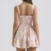 Natassia Minikleid aus Baumwolle mit rosa Wiesenprint Natassia Minikleid aus Baumwolle mit rosa Wiesenprint