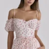 Penelope Midi-Kleid aus Georgette mit weißem Rosenprint und Schleifen Penelope Midi-Kleid aus Georgette mit weißem Rosenprint und Schleifen