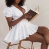 Piera Weißes Plissee-Minikleid Piera Weißes Plissee-Minikleid
