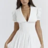 Piera Weißes Plissee-Minikleid Piera Weißes Plissee-Minikleid