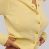 Poppie Lemon Strickjacke aus Wolle und Kaschmir mit Blumenstickerei Poppie Lemon Strickjacke aus Wolle und Kaschmir mit Blumenstickerei