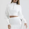 Reeva Weißer Pullover mit Ballonärmeln und Rippmuster Reeva Weißer Pullover mit Ballonärmeln und Rippmuster