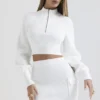 Reeva Weißer Pullover mit Ballonärmeln und Rippmuster Reeva Weißer Pullover mit Ballonärmeln und Rippmuster