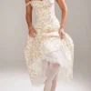 Rosalee – Elfenbeinfarbenes Baumwoll-Bustier-Sommerkleid mit Wiesenmuster Rosalee – Elfenbeinfarbenes Baumwoll-Bustier-Sommerkleid mit Wiesenmuster