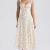 Rosalee – Elfenbeinfarbenes Baumwoll-Bustier-Sommerkleid mit Wiesenmuster Rosalee – Elfenbeinfarbenes Baumwoll-Bustier-Sommerkleid mit Wiesenmuster