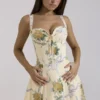 Rosalee Midi-Kleid aus Baumwolle mit Vintage-Bandprint in Zitronengelb Rosalee Midi-Kleid aus Baumwolle mit Vintage-Bandprint in Zitronengelb
