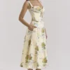 Rosalee Midi-Kleid aus Baumwolle mit Vintage-Bandprint in Zitronengelb Rosalee Midi-Kleid aus Baumwolle mit Vintage-Bandprint in Zitronengelb
