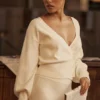 Rowan Ivory Woll-Strickjacke mit Ballonärmeln Rowan Ivory Woll-Strickjacke mit Ballonärmeln
