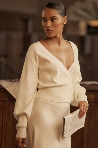 Rowan Ivory Woll-Strickjacke mit Ballonärmeln