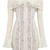 Sadie Vintage cremefarbenes Minikleid mit Blumenmuster und Spaghettiträgern Sadie Vintage cremefarbenes Minikleid mit Blumenmuster und Spaghettiträgern