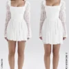 Sancia Weißes Minikleid mit Puffärmeln aus Spitze Sancia Weißes Minikleid mit Puffärmeln aus Spitze