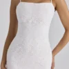 Serenella Weißes Midi-Kleid aus Broderie-Anglaise-Spitze Serenella Weißes Midi-Kleid aus Broderie-Anglaise-Spitze