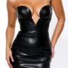 Shia – Schwarzes, trägerloses Midi-Kleid aus veganem Leder Shia – Schwarzes, trägerloses Midi-Kleid aus veganem Leder