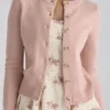Signature Strickjacke aus Pfirsichfarbenem Kaschmir und Merinowolle Signature Strickjacke aus Pfirsichfarbenem Kaschmir und Merinowolle