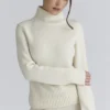 Skye Ivory Rollkragen-Pullover aus Merinowolle Skye Ivory Rollkragen-Pullover aus Merinowolle