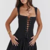 Talia – Schwarzes Plissee-Minikleid Talia – Schwarzes Plissee-Minikleid