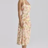 Tallulah Midi-Kleid aus Baumwolle mit Halterneck und Warm-Rose-Print Tallulah Midi-Kleid aus Baumwolle mit Halterneck und Warm-Rose-Print