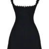 Tilly Schwarzes Minikleid mit Biesen Tilly Schwarzes Minikleid mit Biesen